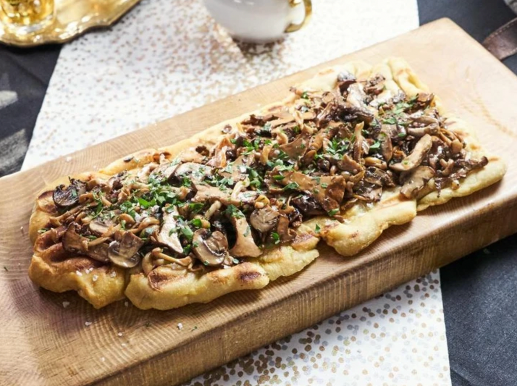 Flatbreads · Zucchini & Fresh Mozzarella OR Caramelized Pears, Manchego, Herbs, Walnuts, Arugula & Pomegranate (2 per order)