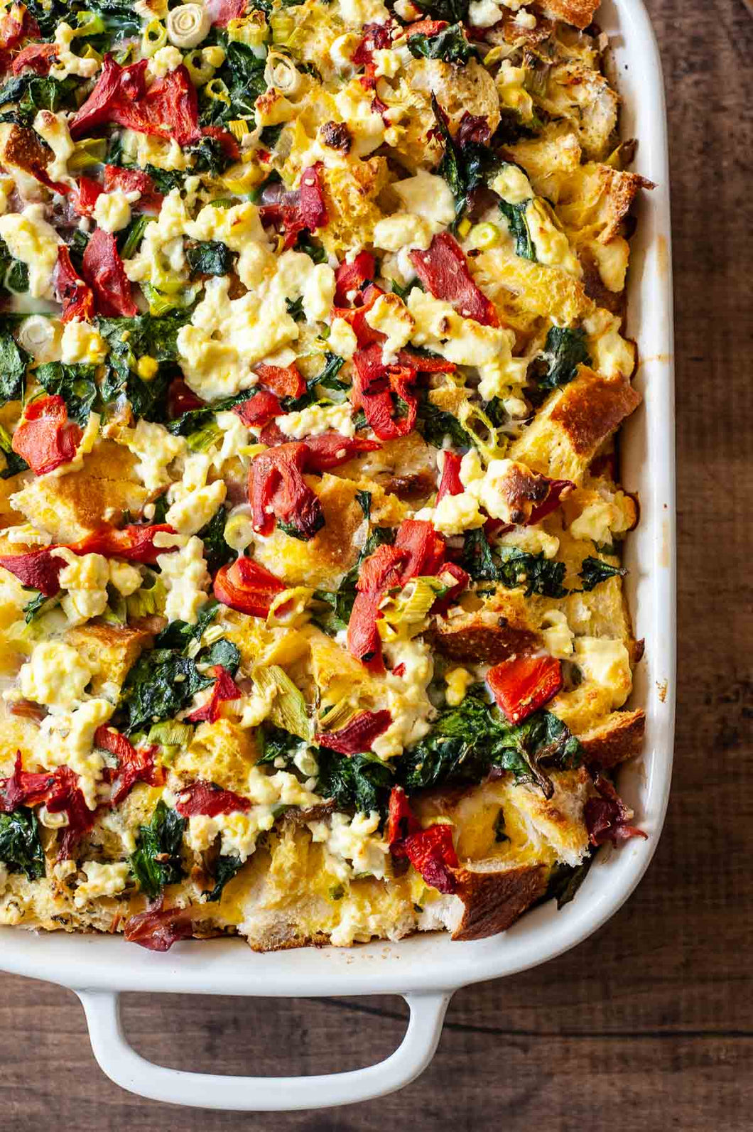 Breakfast Strata – A Breakfast Bread Pudding with Eggs, Sweet Sausage, Tomato, Basil & Two Cheeses  (Serves 6-10 · 1/2 pan)