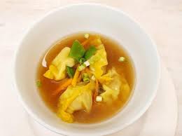 Chicken Dumplings in Ginger Chicken Bone Broth Consommé, Scallions and Summer Greens