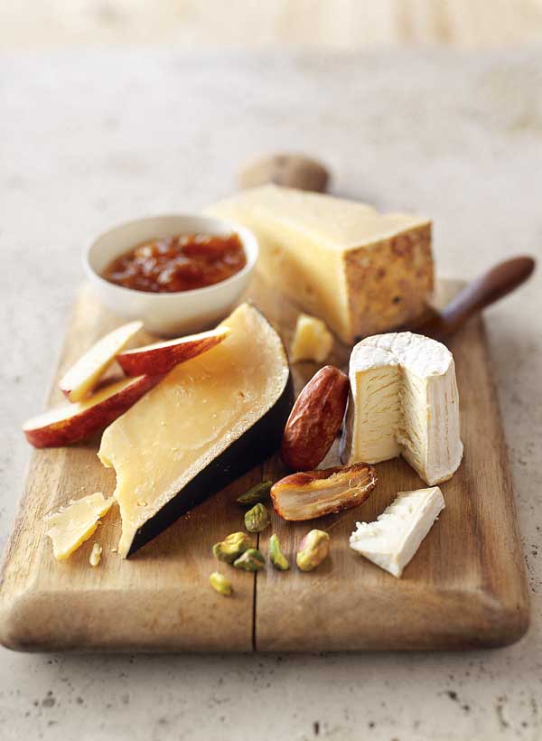 Cheeses ·  Local Artisan, Imported & American Cheeses - Garnished with Dried + Fresh Fruit, Homemade Chutney + Crackers (Serves 6-8)