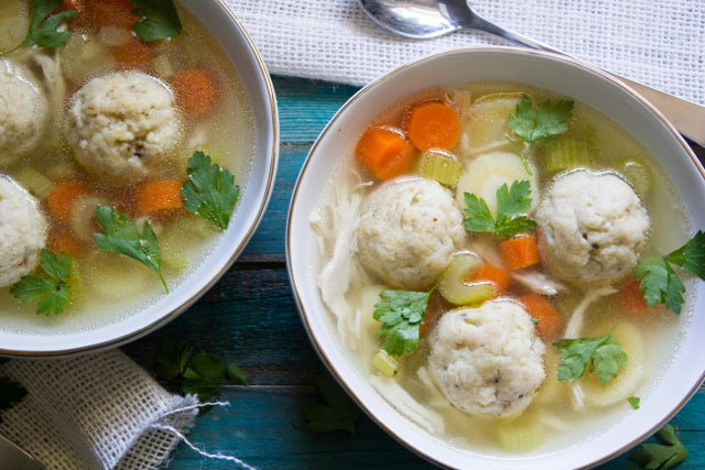 Organic Matzoh Ball Soup · Crafted for Comfort, Beautifully Fortified Chicken Consume + 3 Large Matzoh Balls  (serves 2-3)