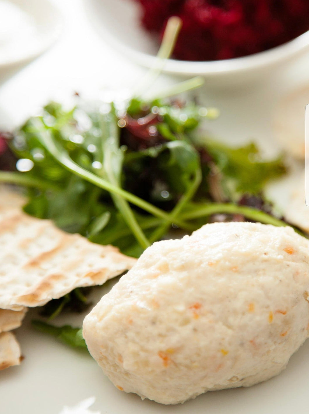 Gefilte Fish · Housemade with Carrots & Freshly Grated Red Horseradish (4 pieces) GF