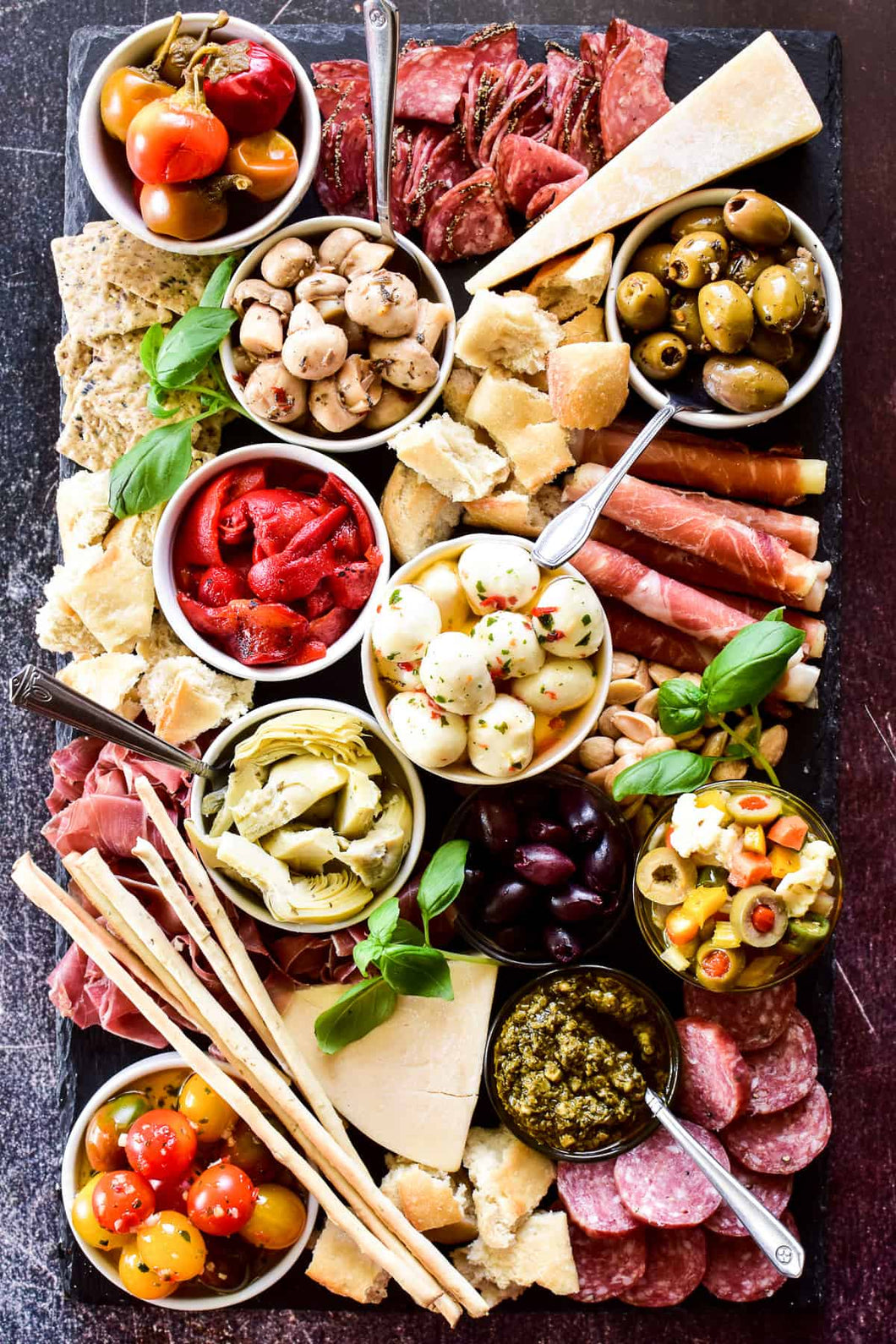 Antipasto – Italian Delicacies including 24 mth aged Prosciutto, Today's Mozzarella, Roasted Sweet Peppers, Artisanal Salamis, Marinated Artichoke Hearts, Pecorino, Tapenade, Caponata and Olives - GF (Serves 6-10)